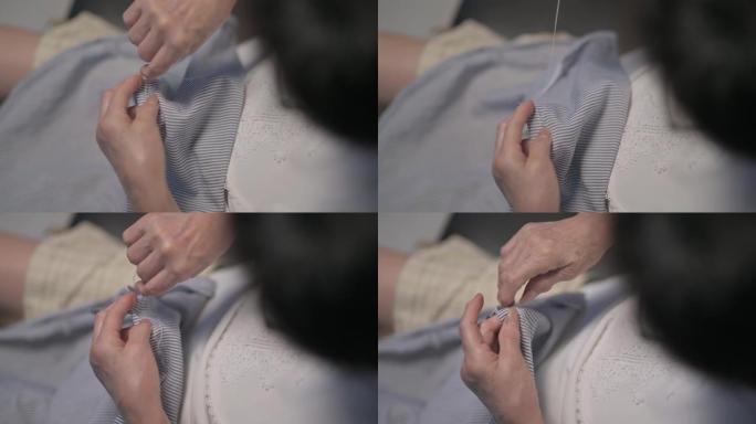俯视图特写亚洲中国高级女性手工缝制服装