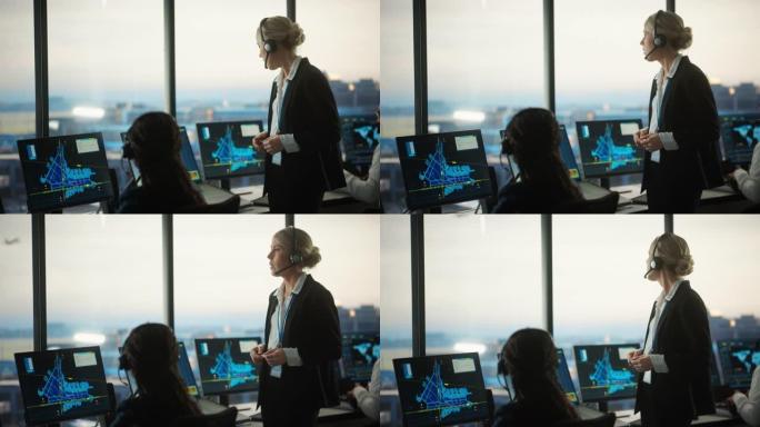 戴着耳机的女性空中交通管制员在机场塔楼通话。办公室里满是台式电脑显示屏，配有导航屏幕，飞机飞行雷达数