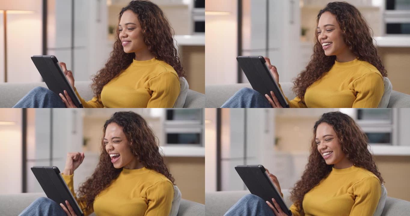一名年轻女子在家中沙发上使用数字平板电脑的4k视频片段