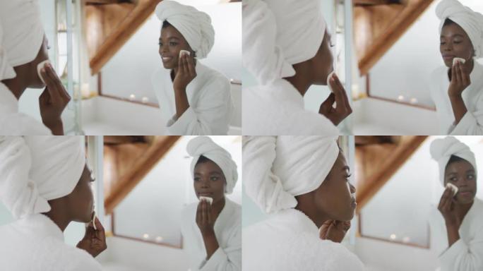 非裔美国迷人女性在浴室卸妆的肖像