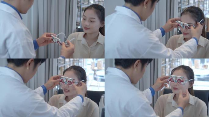 男性验光师使用光学试验架检查女性视力