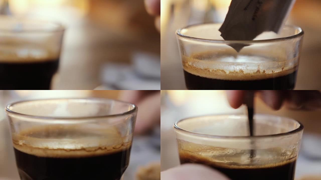 在阿根廷布宜诺斯艾利斯的一家自助餐厅，男人用手将糖包倒入一杯咖啡中。
