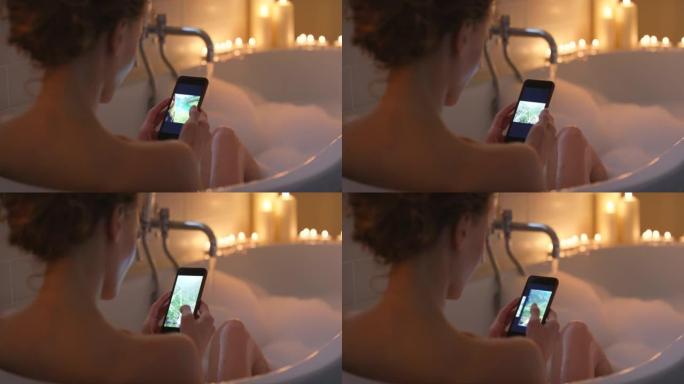 4k视频片段，一名妇女在智能手机上滚动浏览照片