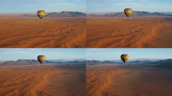 热气球飞越纳米比亚纳米布沙漠无尽沙丘的壮丽风景鸟瞰图