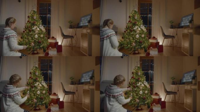 女人独自在家装饰圣诞树