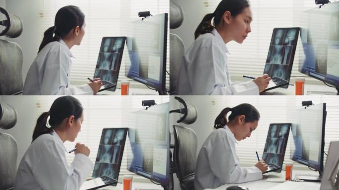 女医生在医院工作空间使用数字平板电脑