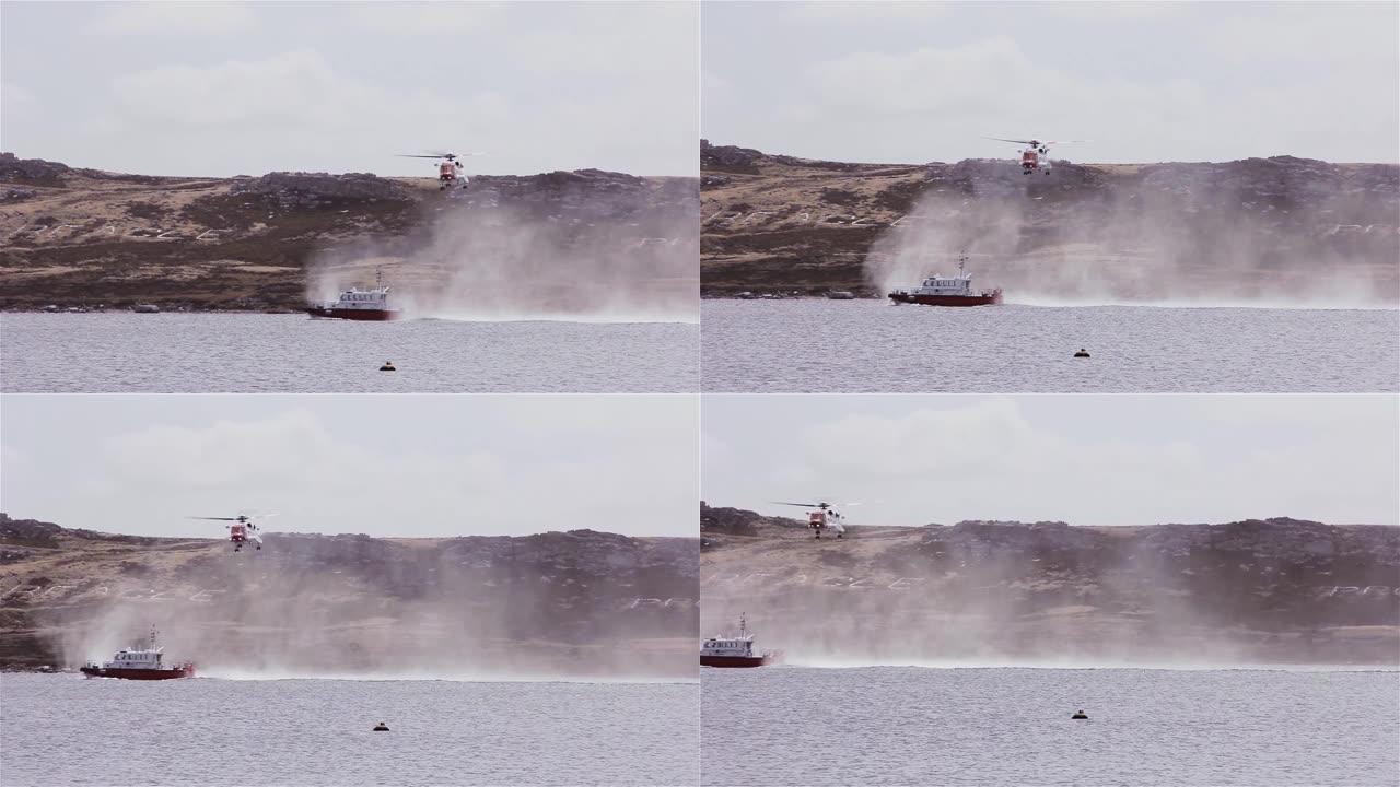在南大西洋福克兰群岛 (马尔维纳斯岛) 举行的皇家海军搜救演习中，直升机和船只。