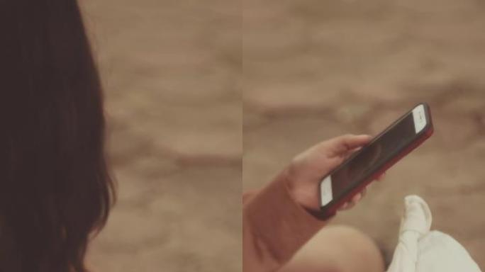 印度少女在玩电话智能手机打字通话购物自拍