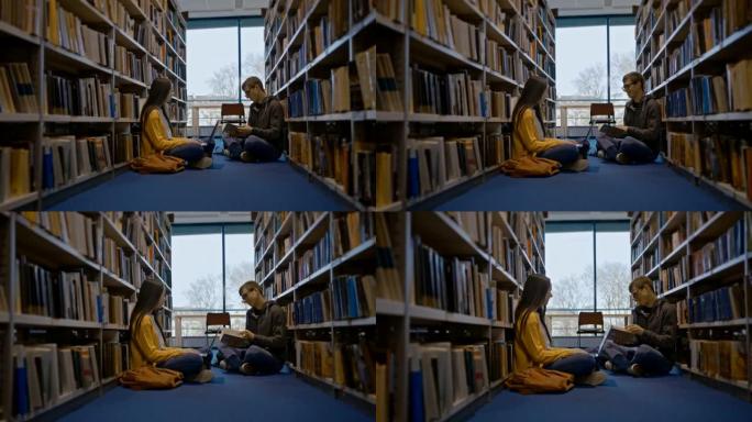 SLO MO学生在书架之间的地板上一起学习
