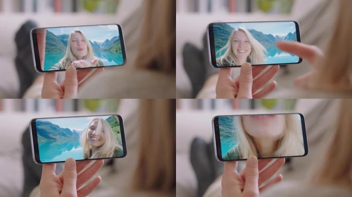 年轻女子视频聊天使用智能手机快乐朋友在挪威度假分享旅游体验享受假期冒险与手机交流4k镜头