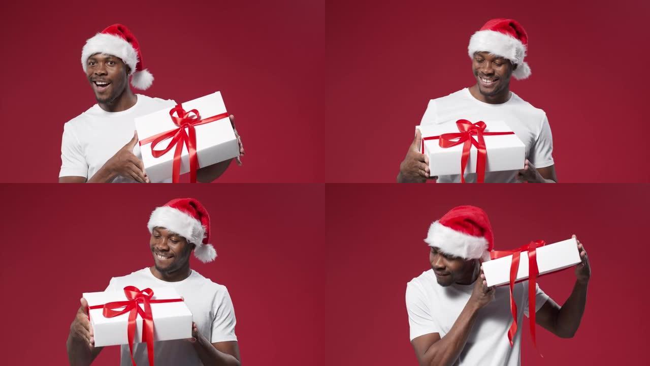 一个戴着圣诞帽的黑皮肤快乐男人转身从四面八方看着礼品盒
