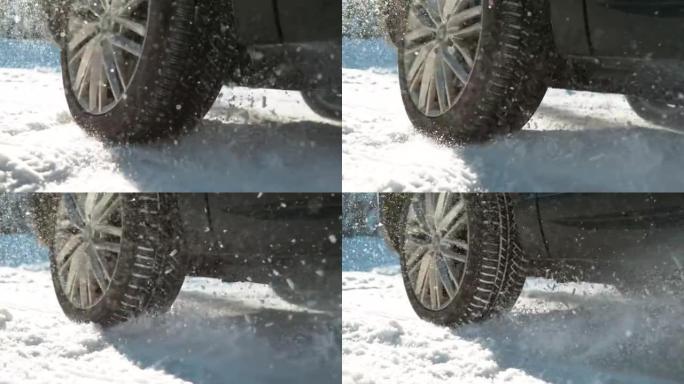 特写，dop: 新鲜的雪从大型车辆的纺车上飞了起来。