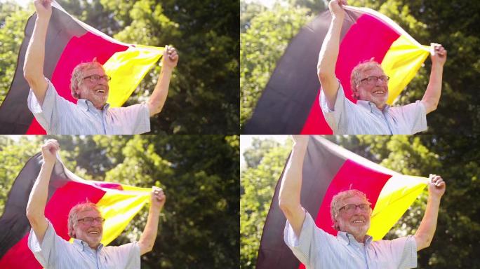 老人带着德国国旗奔跑