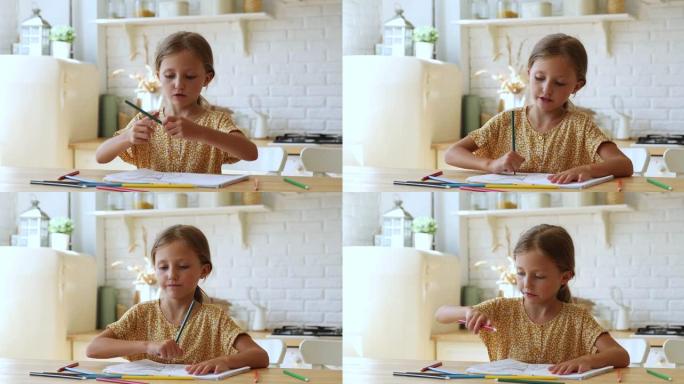 小女孩用彩色铅笔做混乱的动作画画