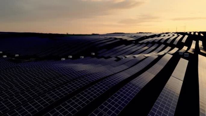 无人机的观点日落反射农村太阳能农场