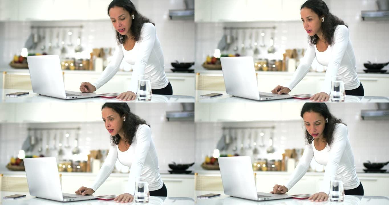 巴西女性在厨房举行视频会议，在家工作