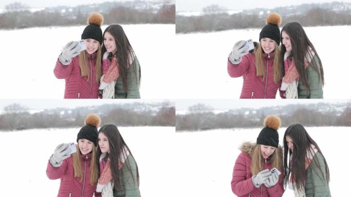 雪中的姐姐自拍姐妹在雪地拍摄