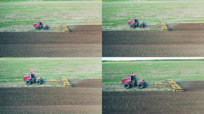 一台机器在田地上行驶，种植种子。