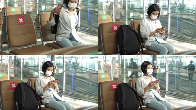 机场候机楼戴口罩的亚洲女孩