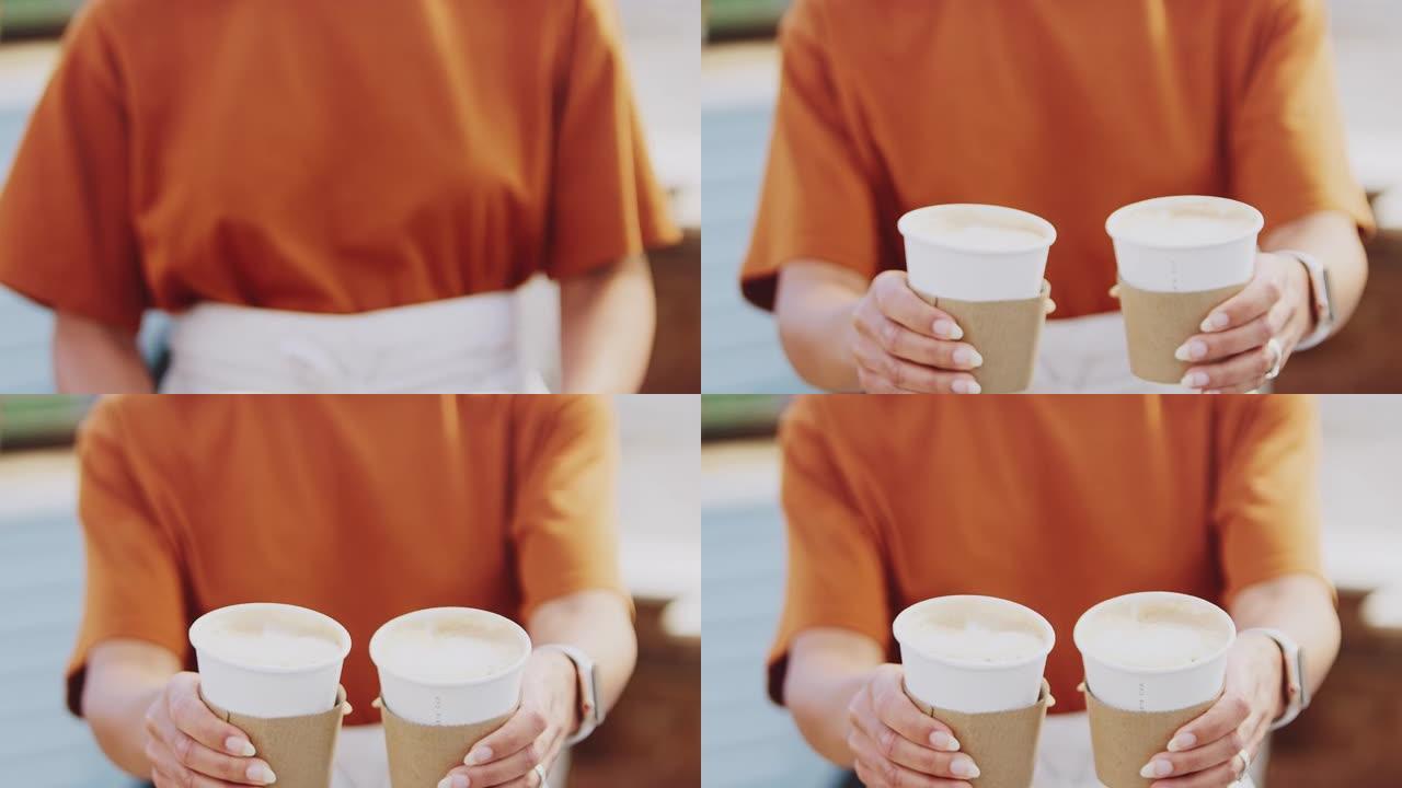 女人在移动咖啡店里拿着外卖杯对着户外摄像机，旁边是慢动作的货车拍摄