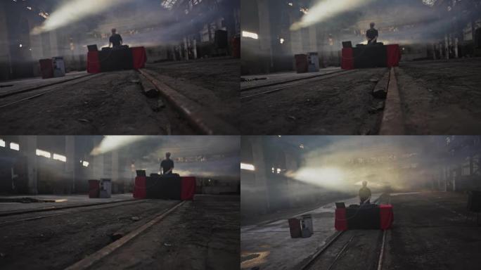 DJ在混音器上播放音乐的剪影