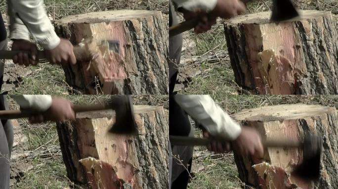男子用斧头切割树干，同时制作 “bomboleg ü ero”，这是当地民间传说中使用的阿根廷鼓。特