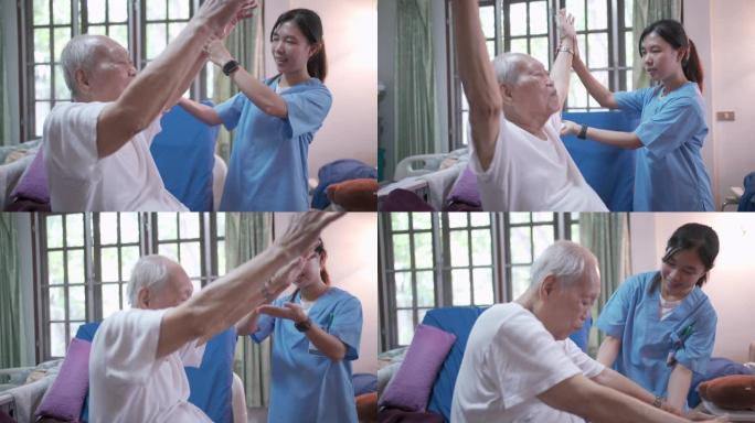 穿着蓝色制服的专业护士帮助亚洲老年残疾人在新型冠状病毒肺炎电晕病毒情况下在家锻炼