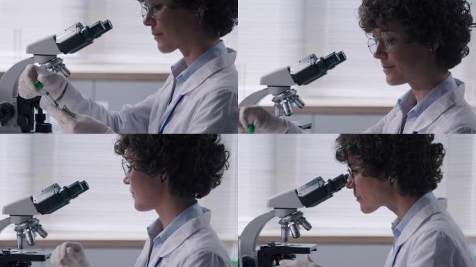 从事显微镜工作的女科学家