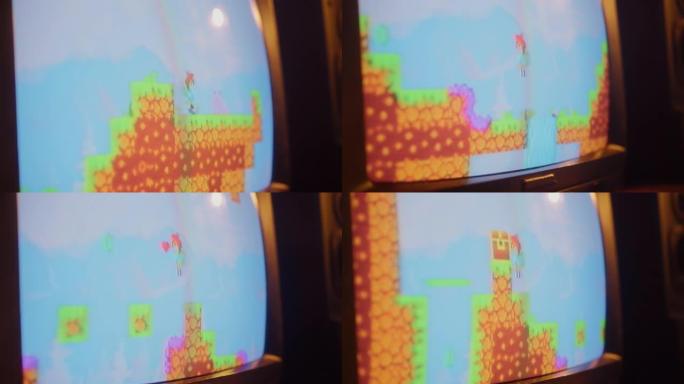 用八位80年代灵感的游戏机街机视频游戏特写复古电视机屏幕的镜头。任务加载，玩家跳过怪物，收集硬币，宝