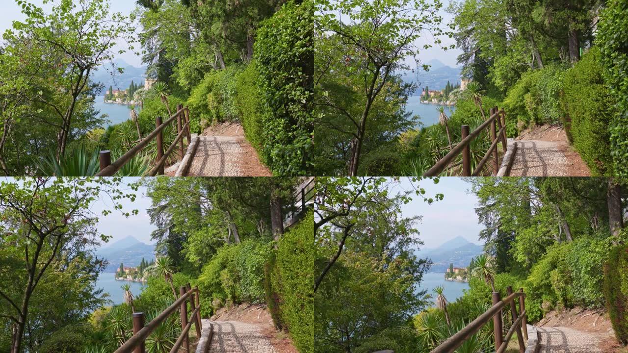 相机沿着意大利科莫湖附近的路径移动。Varenna村附近的villa park Monastero植