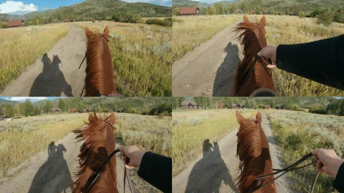 日落时分，女子骑马穿过草地的POV镜头