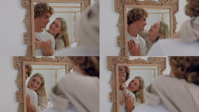 镜子，爱和亲吻一对夫妇在家里一起看着他们的倒影。微笑，亲情和浪漫，男人和女人在他们家的浴室里接吻或亲
