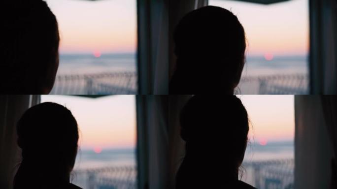 特写女人推开酒店房间窗户的透明窗帘，看着大海上美丽的日落