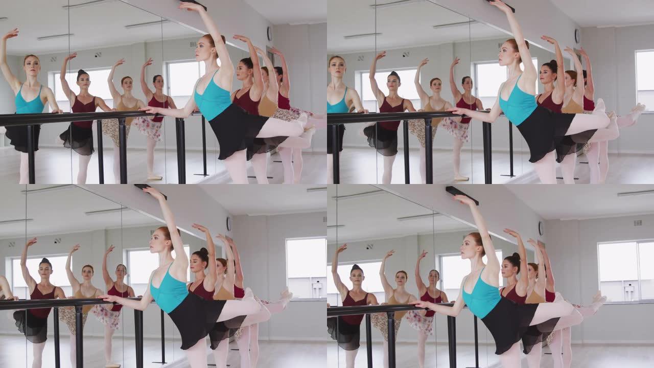 高加索芭蕾舞女舞者在芭蕾舞课上与镜子一起锻炼