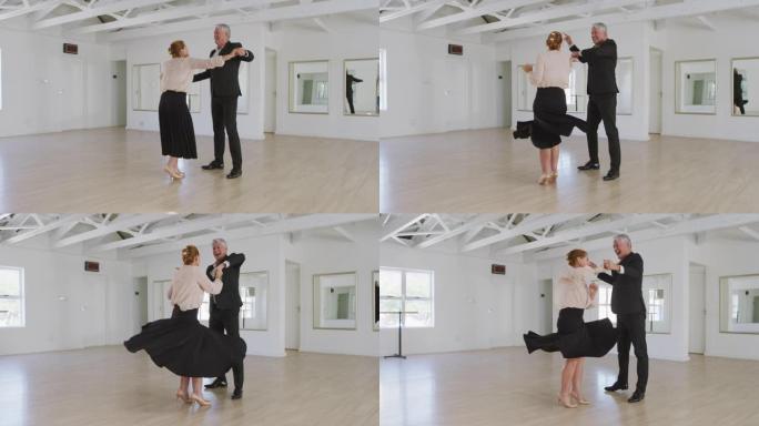 高加索高级夫妇在舞厅里一起跳舞