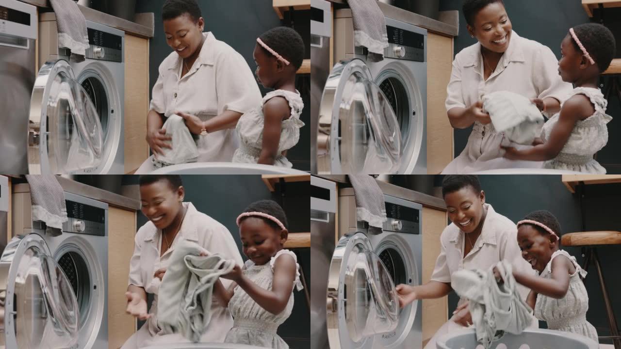 洗衣房，母亲和孩子在房子里帮助折叠衣服。快乐，兴奋和年轻的女孩在家里用洗衣机清洗衣服时向妈妈提供帮助