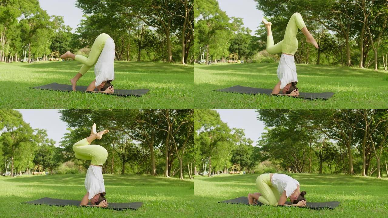 户外瑜伽美女在公园练习瑜伽