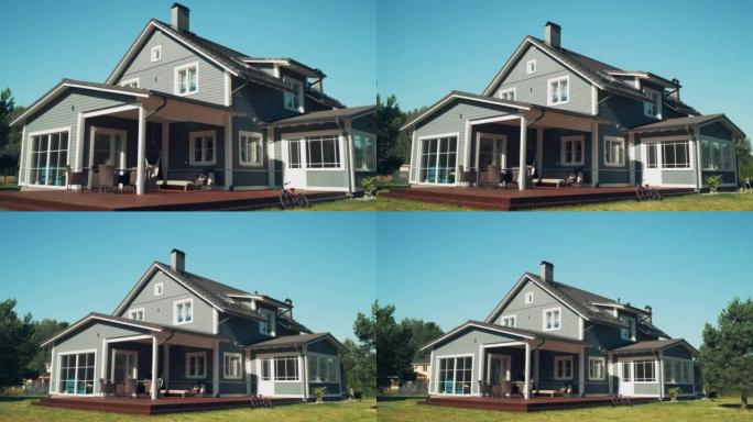建立镜头: 私人乡间别墅站在风景秀丽的乡村，在美丽的夏日，蓝天。郊区家庭景观。缩小镜头。