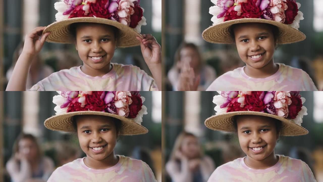 戴着帽子装饰鲜花的可爱女孩