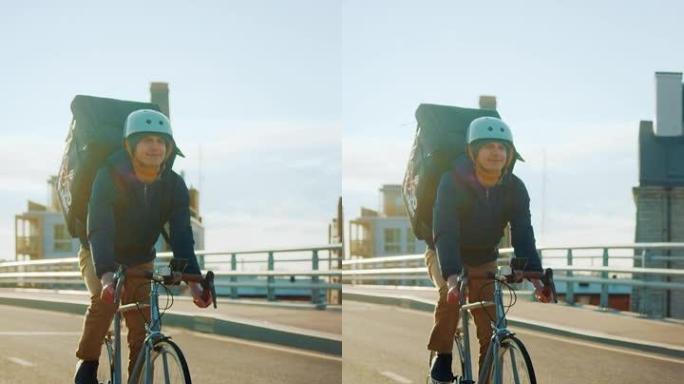 快乐食品配送快递员穿着保暖背包骑着自行车在路上为客户配送订单和包裹。晴天。垂直屏幕方向9:16的视频