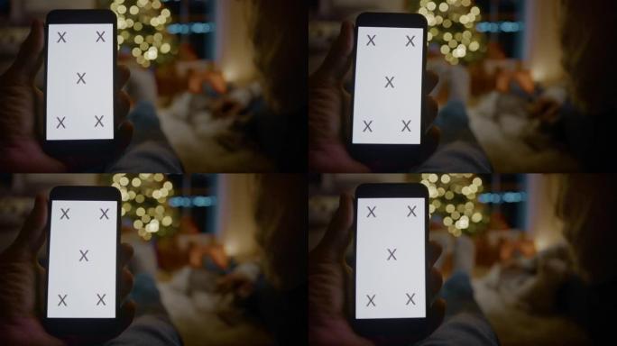CU在圣诞节之夜使用带有色键背景的手机