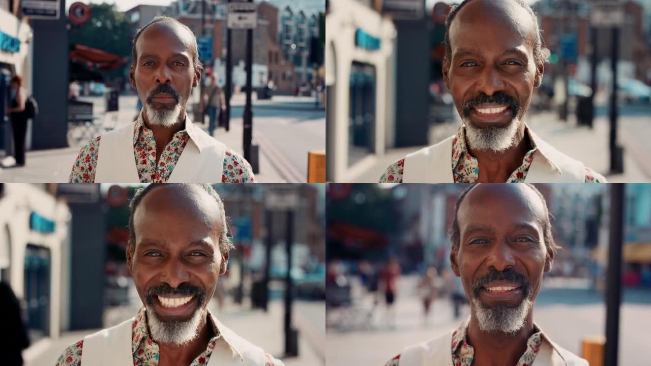 一个快乐的成熟男人在城市背景下的4k视频片段