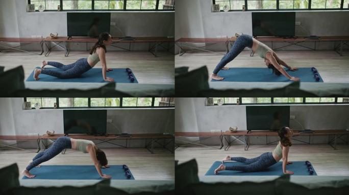 亚洲运动女子在家练习瑜伽