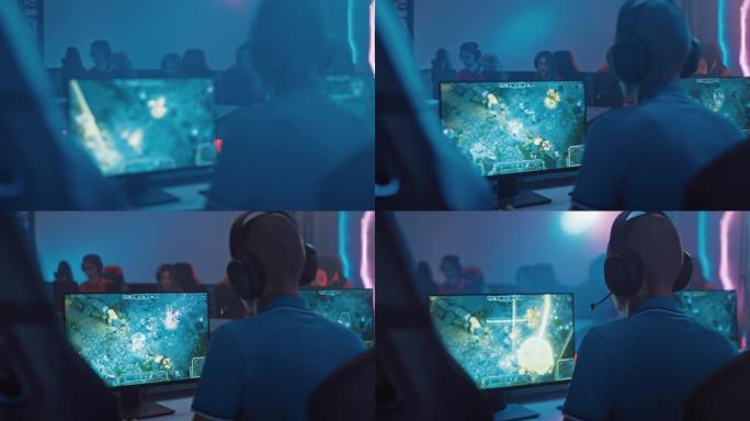 职业玩家在锦标赛上玩电脑RPG策略视频游戏，对着耳机说话。专业游戏玩家组成的多元化Esport团队在