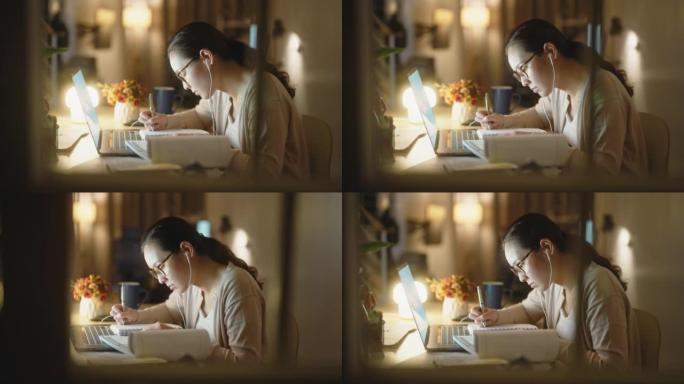 亚洲学生夜间学习上网课自学女子女士