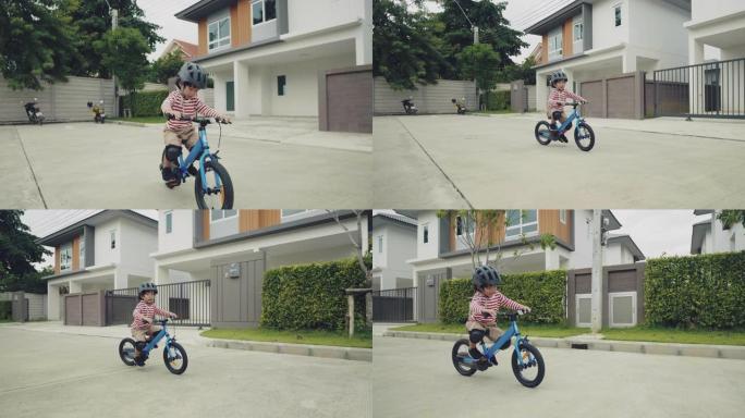 骑自行车的孩子。小男孩骑自行车特写视频素