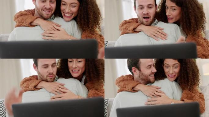 笔记本电脑，夫妻俩在沙发上看电影，并带着快乐的微笑一起大笑，在客厅沙发上拥抱和结合。媒体、家庭娱乐和