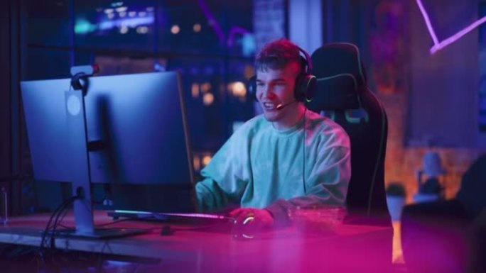 成功的玩家在计算机上的在线视频游戏中获胜。戴着耳机的年轻时尚男子的肖像与其他玩家一起玩PvP锦标赛，