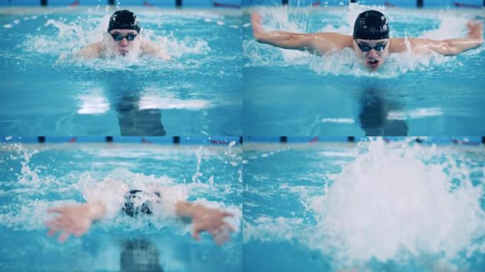 一名男子在游泳池里慢动作游泳蝴蝶
