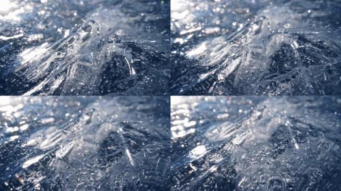 真正透明冰的滑动镜头。相机在冰冻的河流或水体的冰上移动。气候变化概念，冰融化